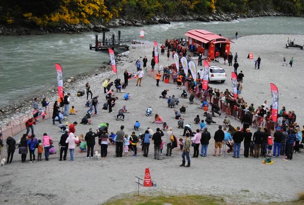 The forty children digging for gold beside the Shotover River.